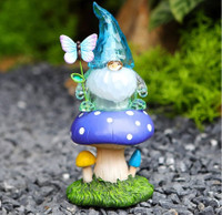 Starryfill Solar Garden Gnome Figurine in Blue Hat Plays with Bu