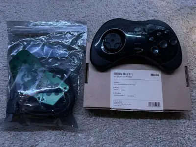 Sega Saturn controller. Comes installed with 8bitdo Bluetooth mod kit. Original PCB board and cables...