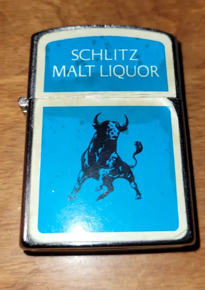 Japan OK lighter rare Schlitz Malt Liquor bull lighter. Has spark no fluid. Discolored logo some pee...