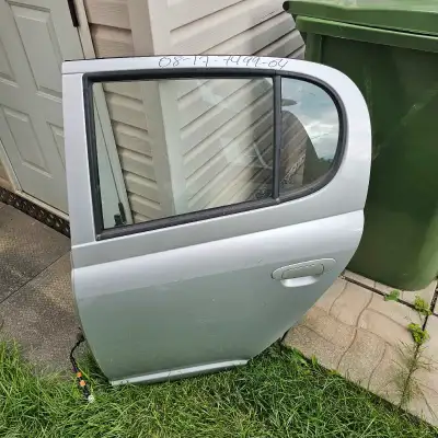 Extremely hard to find in this condition. Toyota Echo hatchback rear drivers side door in excellent...