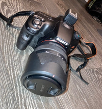 Sony a57 camera + SAL18135 lens + HVL-F45RM flash