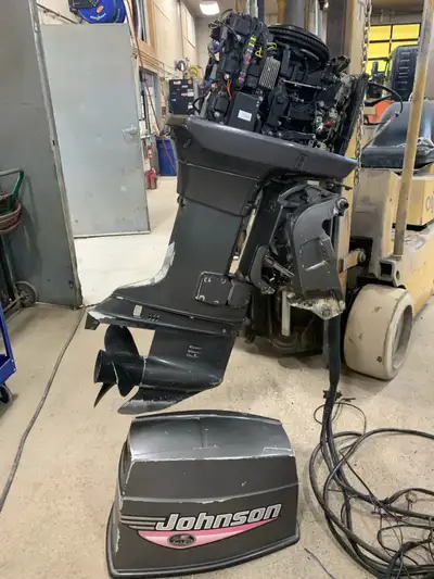 1999 Johnson outboard motor 70hp, runs and drives fine. Quite a few new parts, message for questions...