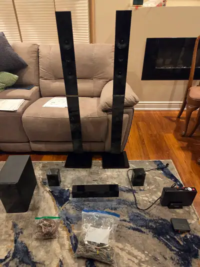 EXCELLENT SAMSUNG SYSTEM. SOUNDS GREAT AND HAS THE ROCKETFISH BLUETOOTH ADAPTER FOR THE BACK TOWER S...