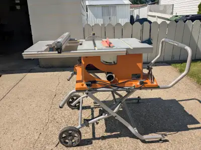 Excellent condition Rigid table saw with all accessories.