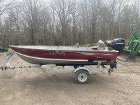 14 ft Lund Adventure Boat with Motor & Trailer