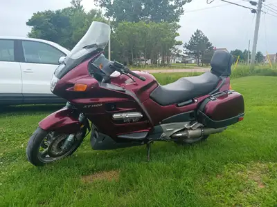 Not many of these around your opportunity to own a unique bike. This 1999 ST100 was built to compete...