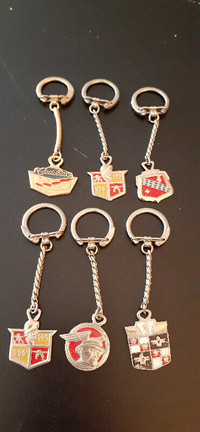 Rare    Vintage  cadillac studabaker key chains