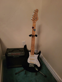 Electric guitar and amplifier-never used