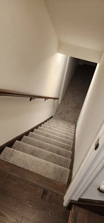 Single room for rent in a basement with a private bathroom and a shared kitchen space. The location...