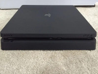 Ps4 slim with 2 controllers and receipt.