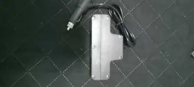 This is a used car charger with 4 ports and 2 USB ports. It is in good working condition, ready to p...