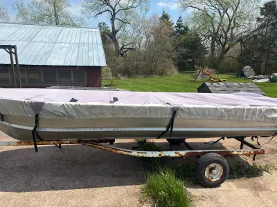 14’ aluminum boat with 6hp Yamaha motor. Boat cover, fuel tank, everything you need to hit the water...