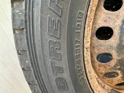 SNOW TIRES ON RIMS 225/65R17 INCH $300.00 OBO GOOD FOR 3 OR 4 WINTERS DEPENDS ON HAVE MUCH YOU DRIVE...
