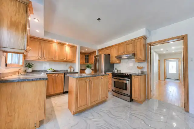 Spacious 5½ Renovated Apartment | Ground Floor with Private Courtyard | Greenfield Park