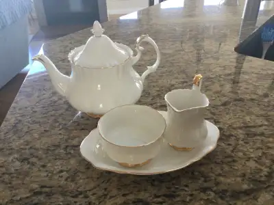 The pattern for these items is Val D’or. Included are 7 mugs, 6 cups and saucers, cream and sugar se...