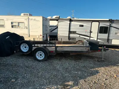Excellent 7x12 utility trailer. Single 3500lb axle. Used it to tow my quads but needed something big...