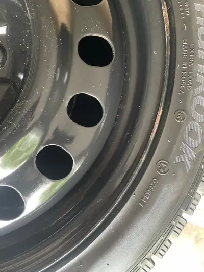 Set of four Excellent Hankook winter tires with rims. The tire number is 215-45-17. The rear bolt pa...