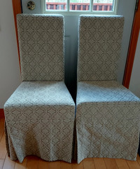 FOUR SLIPCOVERED DINING CHAIRS