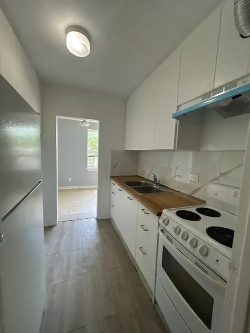 large open-concept Living and Dining Room, 1 bedroom, fridge and stove provided, one parking space i...