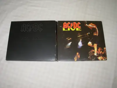 AC/DC - CDs. Priced *as noted*. Both in EX condition. - Back In Black (16 page booklet, 6 panel digi...