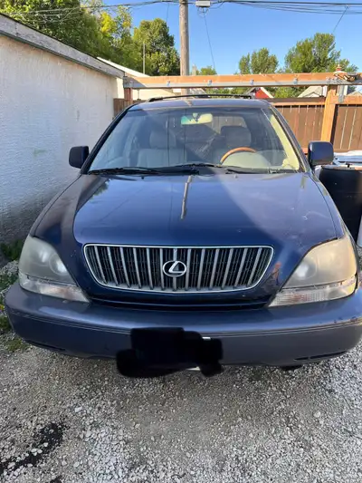 Hi selling my 2003 RX300. Clean title. Car is good for parts or project. Engine runs strong. Problem...