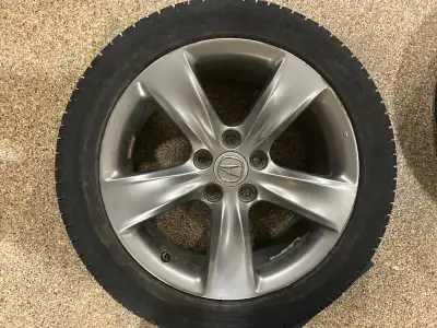 Selling a full set of 18-inch Michelin X-Ice winter tires mounted on OEM Acura TL rims. Came off a 2...