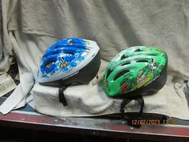 2 Youth Bicycle Helmets. Louis Garneau. Green and Blue