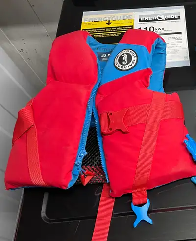 Mustang Survival Lil Legends Life vest. Bought at Rammakkos. Too small now. Used one season. Retail...