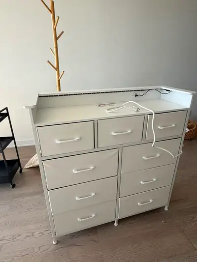 White 9-Drawer Storage Dresser with LED Lights – $30, View more