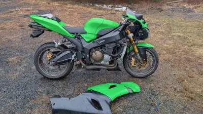 2005 Kawasaki ZX6R. Needs very little to put back on road. Has a current salvage title. Mostly plast...