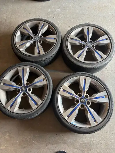 4 Hyundai Veloster summer tires with rims the tire size is 215/40ZR18 bolt pattern is 5x114.3 one of...