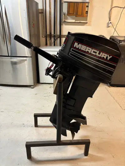 Selling a 1995 Mercury 20 HP outboard motor (Made in the USA by Mercury Marine, a division of Brunsw...