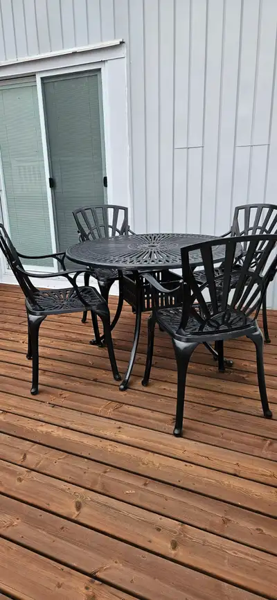 Black cast iron patio set, View more