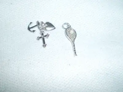 Vintage sterling silver charms - Tennis racket with pearl - $60-- Measures 1" - Heart, cross and anc...