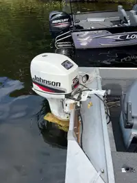 1998 25 hp Johnson outboard 2 stroke, electric start long shaft.