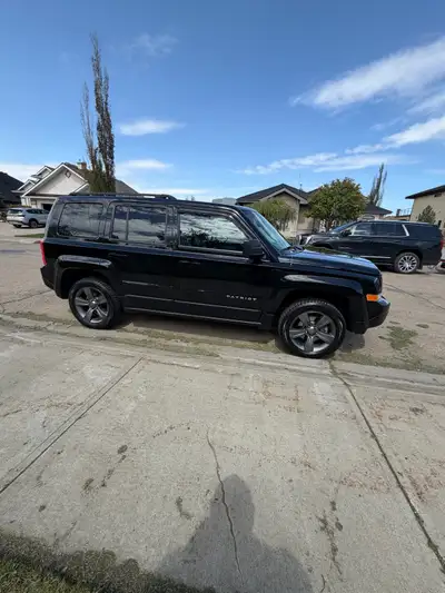 This 2015 Jeep Patriot features a reliable engine and has 160,590 kilometers on the odometer, making...
