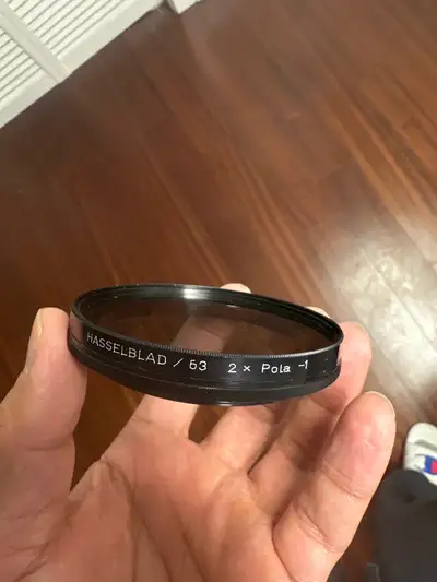 This is a used Hasselblad 53 2x Pola filter, designed to enhance your photography by reducing glare...