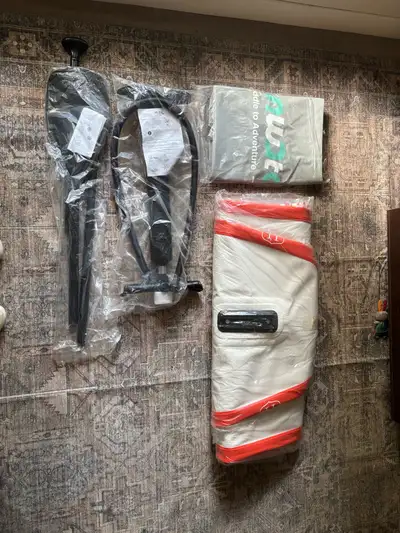 Never used paddle board, paddle, pump and bag, View more