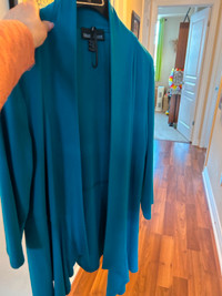 Light weight long sleeved open front cardigan.