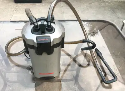 Looking to sell a great condition canister filter, runs and works with issue, comes with all the med...