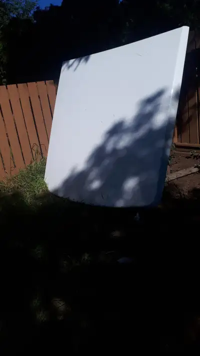 1 piece solid locking tonneau cover wht. Came off 2017 Dodge 1/2 ton 4dr shortbed. Must be gone befo...