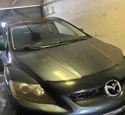 2011 Mazda CX-7 AS IS or for PARTS. Known issue it Has a hole in one part of the subframe which weak...