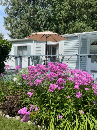 Enjoy space, comfort, and convenience with this furnished, 1,000 sq ft, 3-bedroom mobile home on 10...