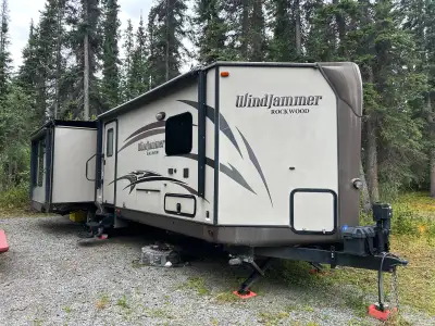 Selling my 2014 Rockwood Windjammer 3029W. This is a clean, well-maintained trailer with a triple sl...