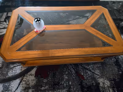 Great condition for over 30 years old. Olefin couch recently refoamed. Coffee Table with wheels, woo...