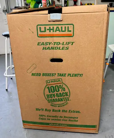 Wardrobe box. Used once. Comes complete with metal rod.