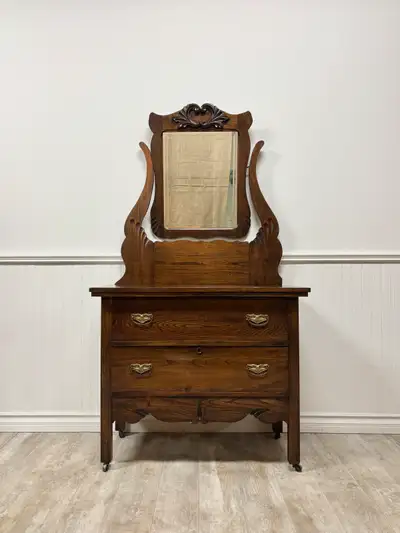 This antique dresser is in fabulous condition!! Solid oak with a dark stain. Dresser can be used wit...