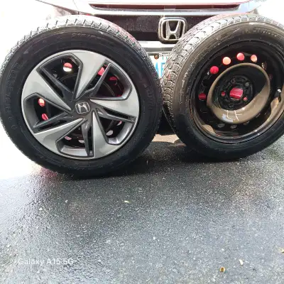 4 used M/S winter tires on Honda 16 inch rms with hubcaps. Size: 215/55/16 and bolt pattern is 5x114...