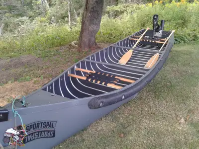 Flatback 14 ft. canoe, and..... Enduramax electric motor 55 lb. thrust, 12 vlt. Power Series deep cy...
