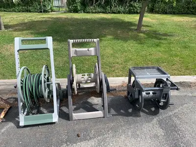 Selection of hose reels. All in good shape. Do not come with any hoses. Various prices, $25-$40.
